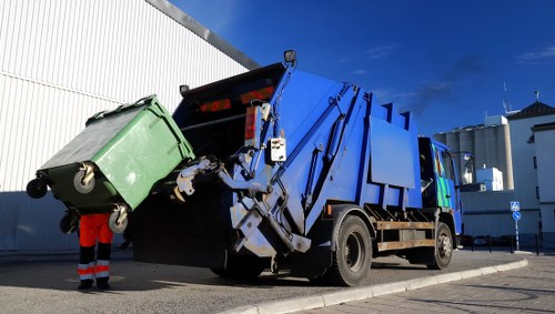 Company van at commercial waste site